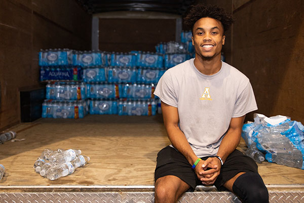 Appalachian student teams up with staff to deliver bottled water for hurricane relief