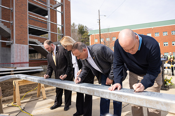 Topping out ceremony held for App State’s Holmes Convocation Center Parking Deck